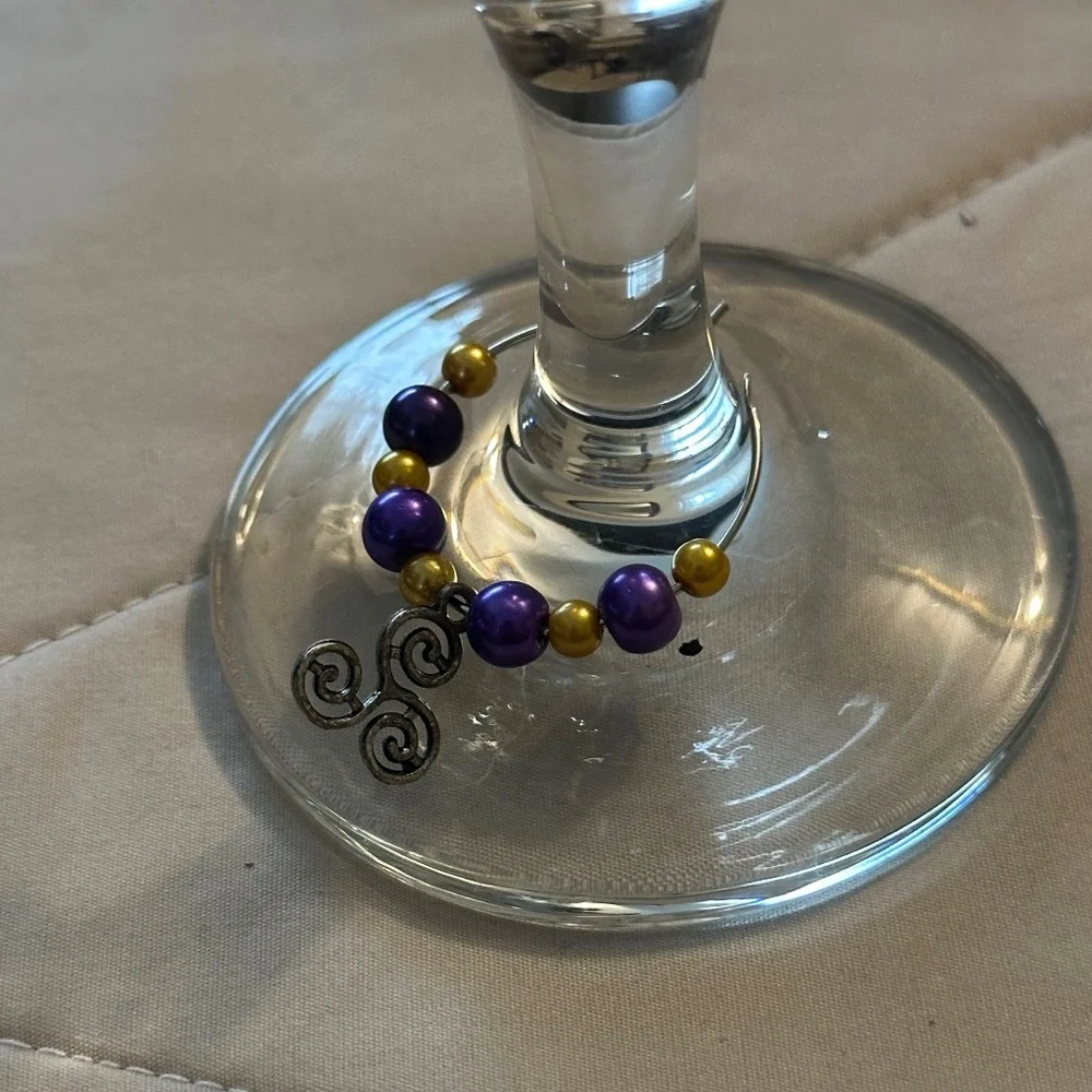 Wine glass tag stainless steel hoop gold/purple beads Celtic triple spiral